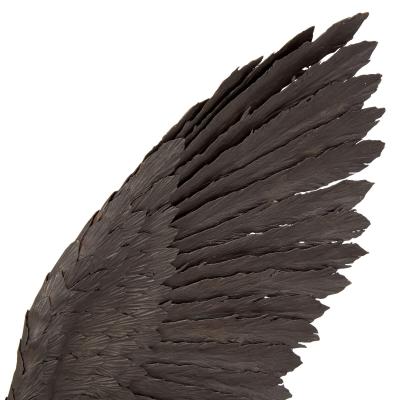 Large patinated steel and rock model of an eagle