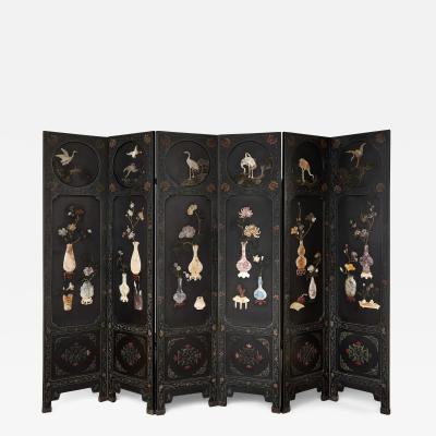 Large six panelled Chinese hardstone and lacquered folding screen
