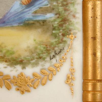 Large three piece porcelain champlev enamel and ormolu mounted clock set