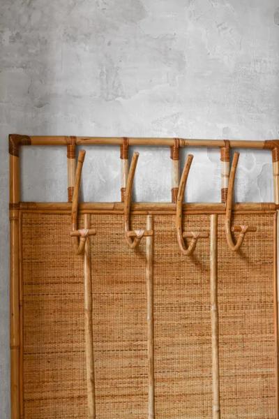 Large wall coat hanger in rush and wicker Italy 1980