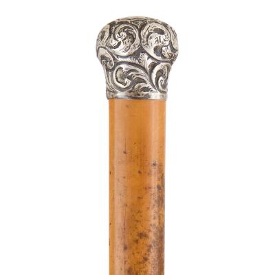 Late 19th century Arts Crafts style silver mounted walking stick