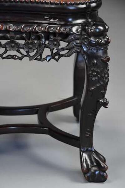 Late 19th century Chinese hardwood pot stand with shaped marble inset top