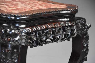 Late 19th century Chinese hardwood pot stand with shaped marble inset top