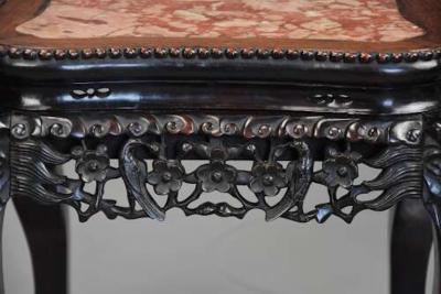 Late 19th century Chinese hardwood pot stand with shaped marble inset top