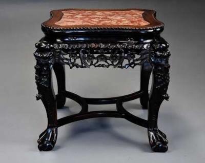 Late 19th century Chinese hardwood pot stand with shaped marble inset top
