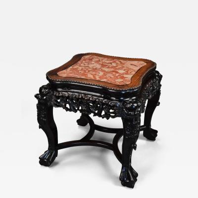 Late 19th century Chinese hardwood pot stand with shaped marble inset top