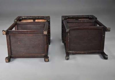 Late 19thc matched pair of freestanding Chinese hardwood pot stands