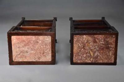 Late 19thc matched pair of freestanding Chinese hardwood pot stands