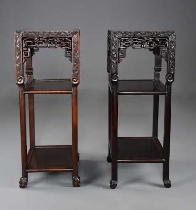 Late 19thc matched pair of freestanding Chinese hardwood pot stands