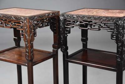 Late 19thc matched pair of freestanding Chinese hardwood pot stands