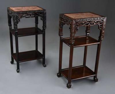 Late 19thc matched pair of freestanding Chinese hardwood pot stands