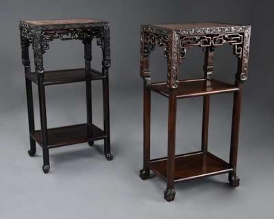 Late 19thc matched pair of freestanding Chinese hardwood pot stands