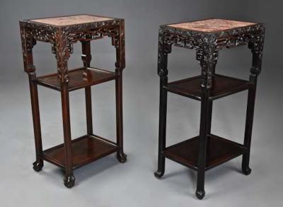 Late 19thc matched pair of freestanding Chinese hardwood pot stands