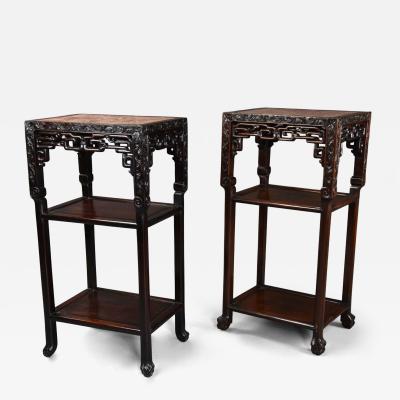Late 19thc matched pair of freestanding Chinese hardwood pot stands