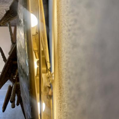 Late 20th Century Pair of Italian Hammered Brass Cast Brass Shield Sconces