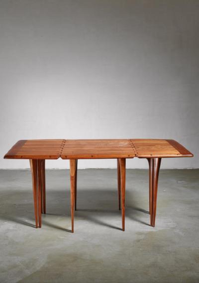 Lee Swennes Lee Swennes studio craft drop leaf table with sixteen legs American 1960s