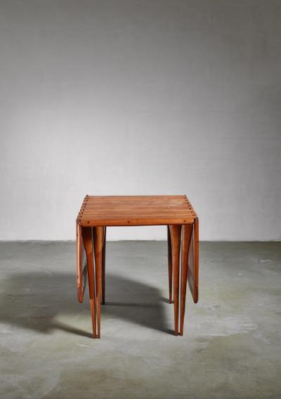 Lee Swennes Lee Swennes studio craft drop leaf table with sixteen legs American 1960s