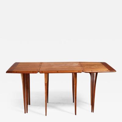 Lee Swennes Lee Swennes studio craft drop leaf table with sixteen legs American 1960s