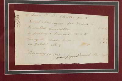 Letter Fragment and Antique Coins in Burgundy Matting and a Gilt Frame