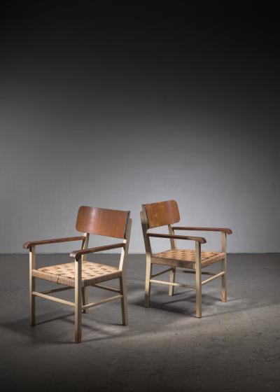 Light and transparent pair of Scandinavian Modern armchairs