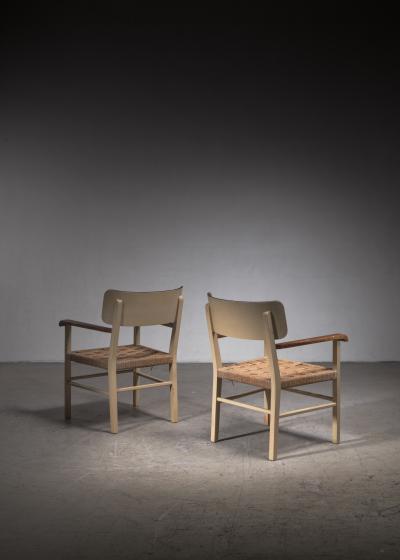 Light and transparent pair of Scandinavian Modern armchairs