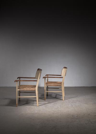 Light and transparent pair of Scandinavian Modern armchairs
