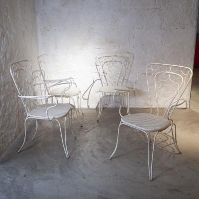 Lio Carminati Lio Carminati four chairs iron 1950s
