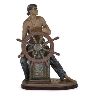 Lladro Glazed ceramic sculpture of a helmsman by Spanish maker Lladr 