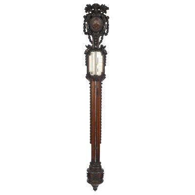 Lord Vernon s Sudbury Hall lime wood barometer by J Braund after Grinling