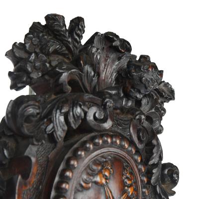 Lord Vernon s Sudbury Hall lime wood barometer by J Braund after Grinling