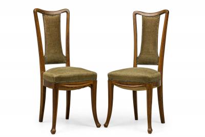 Louis Majorelle Set of 8 Louis Majorelle Carved Walnut and Sage Green Muslin Side Chairs