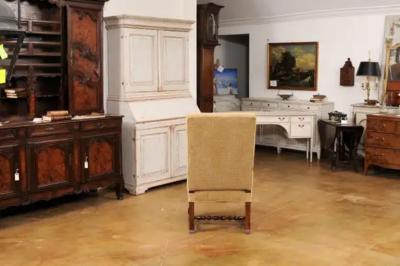 Louis XIII Style Walnut French Fauteuil with Scrolling Arms and Turned Base