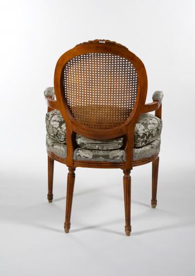 Louis XVI Style Walnut Caned Needlepoint Lounge Chairs