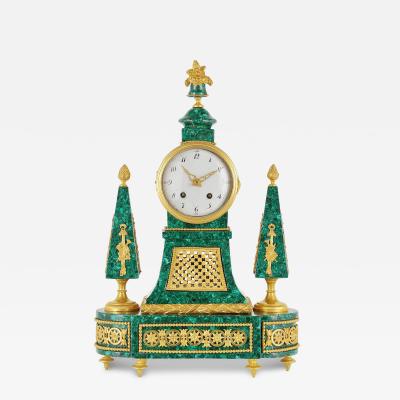 Louis XVI period gilt bronze mounted malachite clock