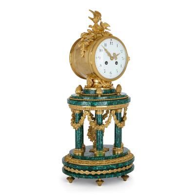 Louis XVI style ormolu mounted malachite column mantel clock