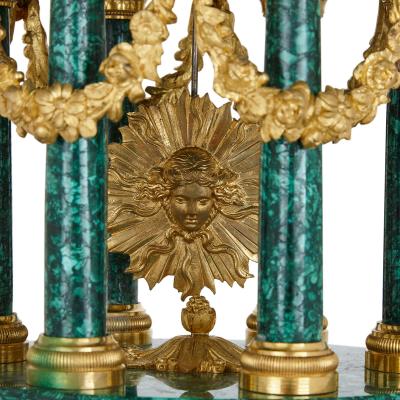 Louis XVI style ormolu mounted malachite column mantel clock