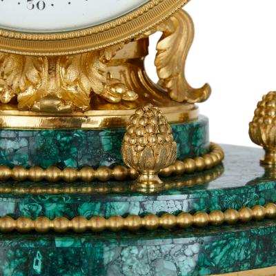 Louis XVI style ormolu mounted malachite column mantel clock