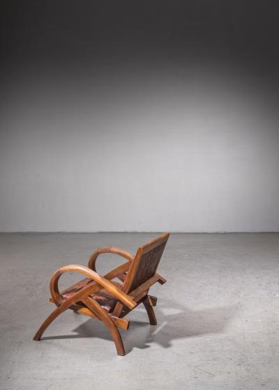 Lounge chair with woven leather seating Mexico