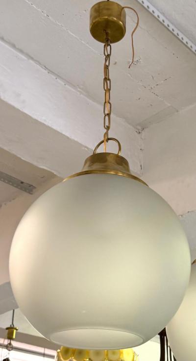 Luigi Caccia Dominioni Pair of Italian Midcentury Brass Satin Glass Ball Pendants by Caccia Dominioni
