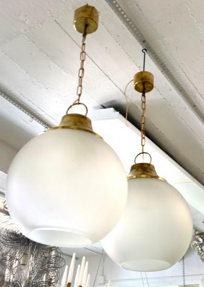 Luigi Caccia Dominioni Pair of Italian Midcentury Brass Satin Glass Ball Pendants by Caccia Dominioni