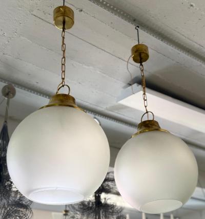 Luigi Caccia Dominioni Pair of Italian Midcentury Brass Satin Glass Ball Pendants by Caccia Dominioni