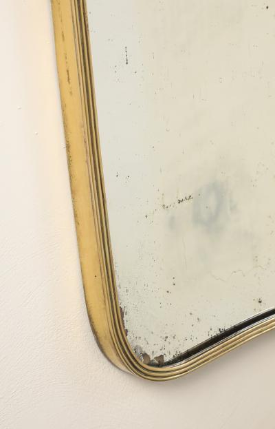 Luigi Fontana Luigi Fontana 1940s Brass Shaped Wall Mirror with Decorative Scroll Crest