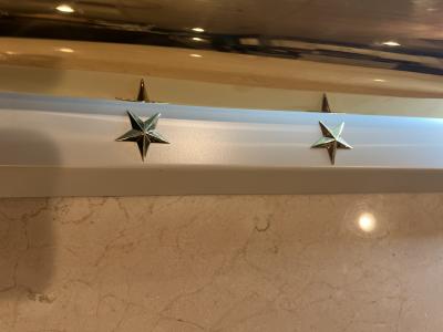 MAGNIFICIENT ART DECO BRASS AND GLASS SCONCES WITH STAR ACCENTS
