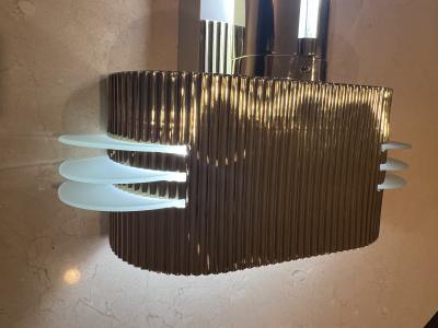 MAGNIFICIENT ART DECO BRASS AND GLASS SCONCES WITH STAR ACCENTS