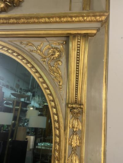 MAGNIFICIENT MONUMENTAL CARVED GILT CREAM TRUMEAU MIRROR WITH OVAL PAINTING