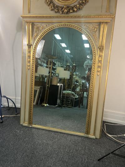MAGNIFICIENT MONUMENTAL CARVED GILT CREAM TRUMEAU MIRROR WITH OVAL PAINTING