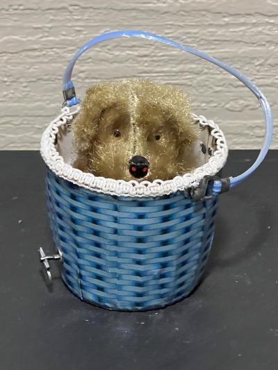 MID CENTURY ADORABLE PEEK A BOO PUPPY IN BASKET KEY WIND TOY
