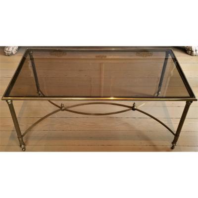 MID CENTURY BRASS SMOKED GLASS COFFEE TABLE WITH CURVED STRETCHER
