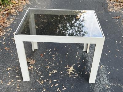 MID CENTURY LACQUERED WOOD AND SMOKEY GLASS COFFEE TABLE