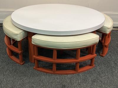 MID CENTURY ORANGE RATTAN STOOLS AND LAMINATE COFFEE TABLE